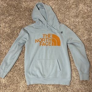 Blue with orange writing men’s north face hoodie